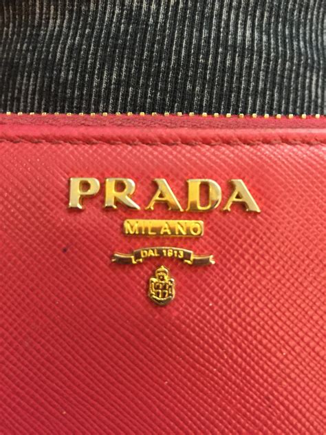 difference between fake and real prada wallets|genuine prada leather.